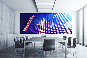 Bright LED video wall with seamless display at a conference.