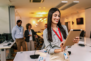 Tablet used at an event with badges/passes instead of laptops